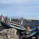 Broken boats at Madh Koliwada in the aftermath of Cyclone Takutae.